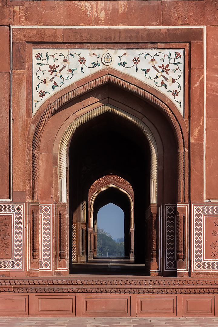 Looking through the halls of the Mughal mosque at the Taj Mahal